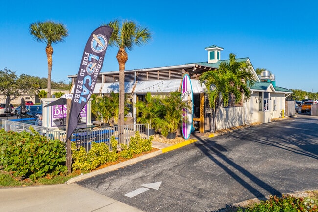 Savor tasty bites and laid-back vibes at Long Doggers in Satellite Beach.