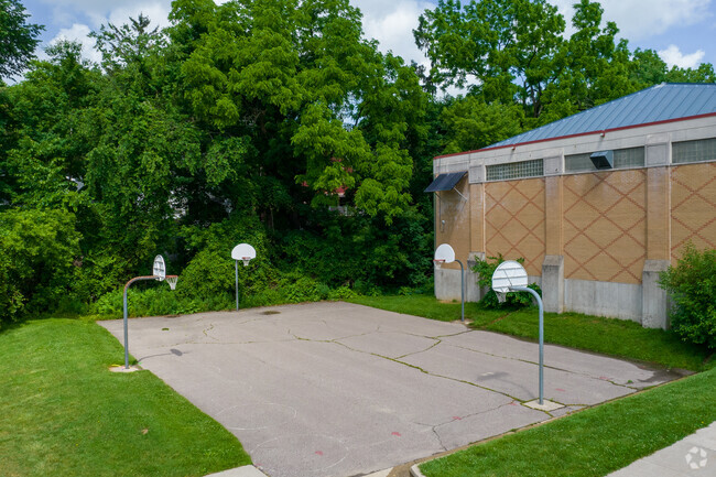 Shoot hoops on the basketball court behind the Slauson Middle School located in Ann Arbor, MI.