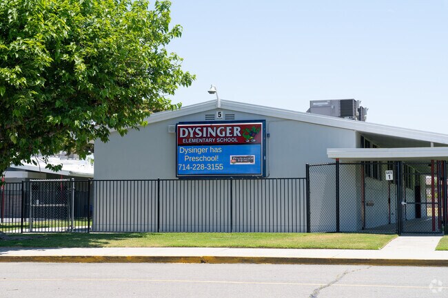 Dysinger Elementary School pylon showing upcoming events and school information.