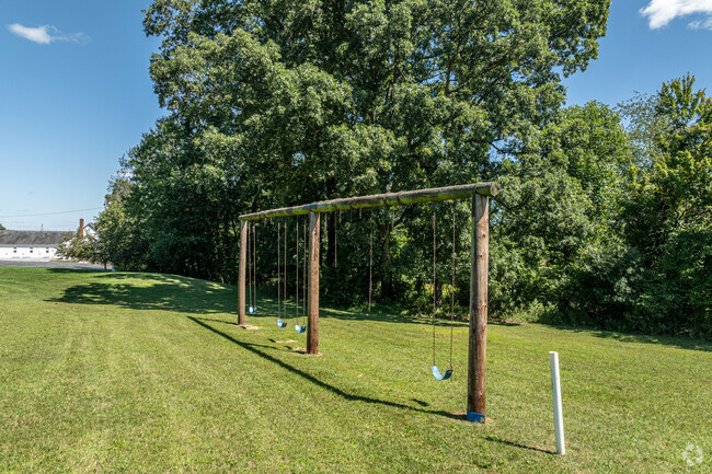 The swings at Pleasant Hill are a popular destination for younger students.