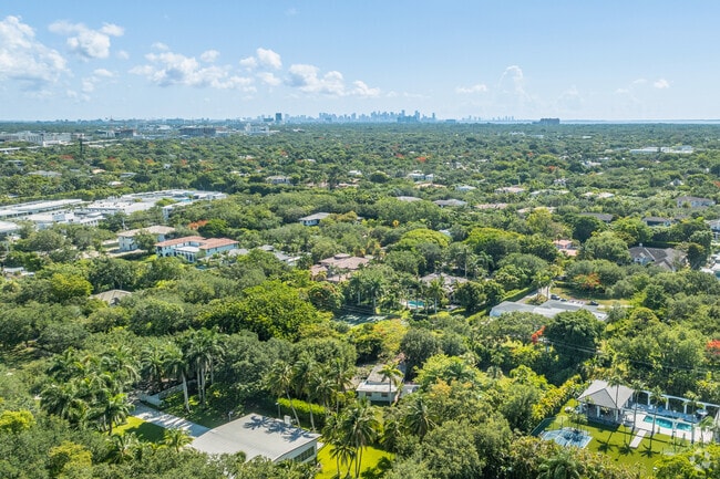 The residences of Pinecrest sit amongst tropical landscape in sprawling subdivisions.