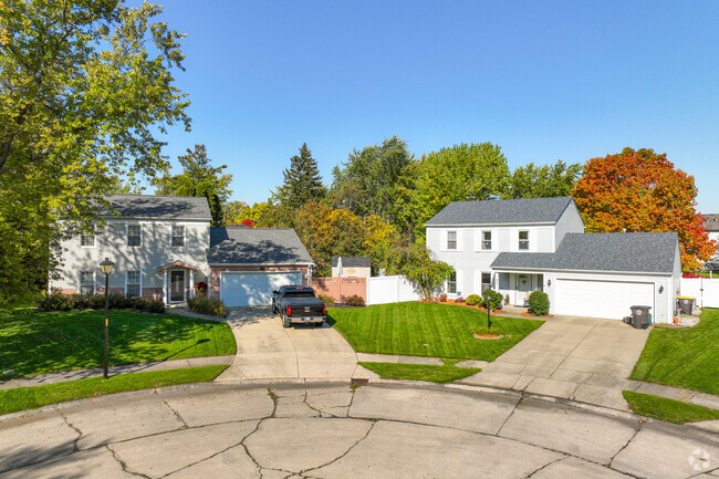 Colonial homes with attached garage are very popular in Old Brook Farms neighborhood.