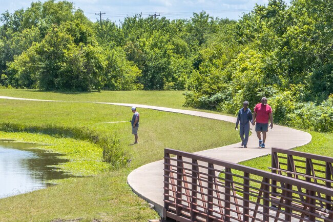 The walking trail at Rowlett Community Park sees many residents from Garland.