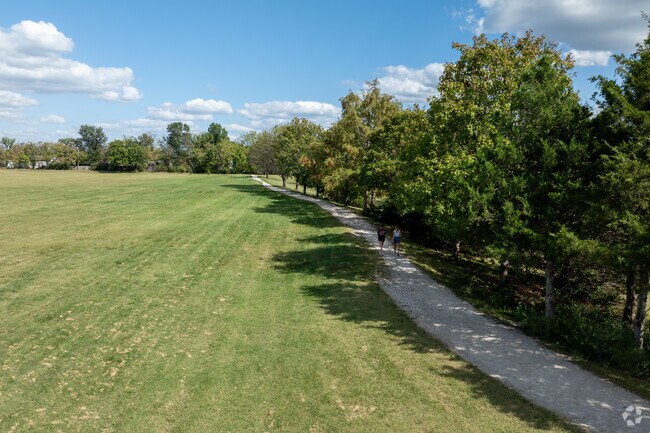 Rock Quarry Park has a large paved walking path around it's perimeter.