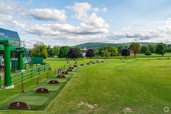 The base of Hartford' ski area at Quechee Lakes becomes a driving range in summer.