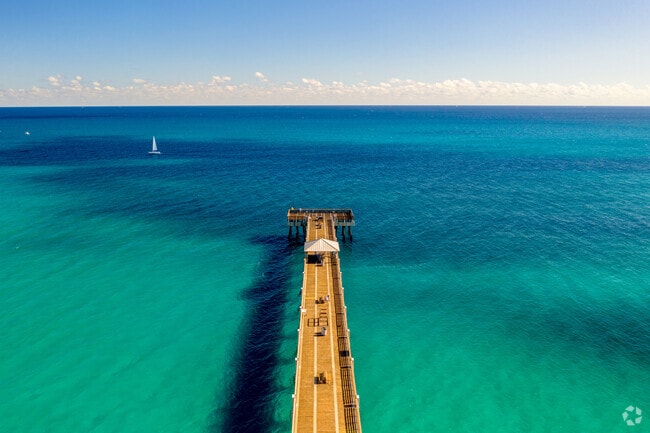 The water at Juno Beach is remarkably clear and clean.