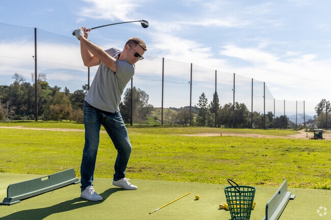 A talented golfer practices his swing at Scholl Canyon Golf Course in Chevy Chase.
