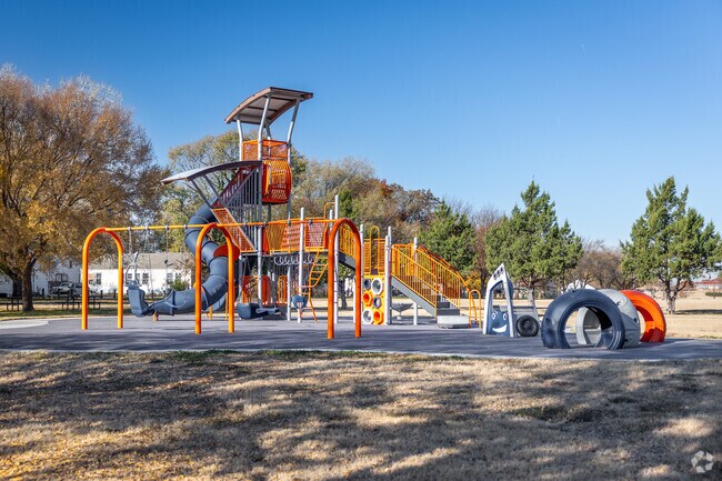 Kids can climb on the playground at Friendship Park in Hilltop.