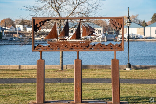 Enjoy local artwork and sculptures that line the lakefront in Harbor Side.