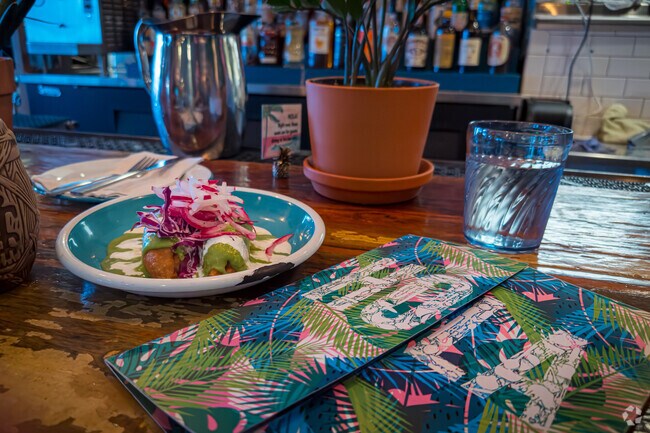 Enjoy a colorful dish at Hola Arepa.