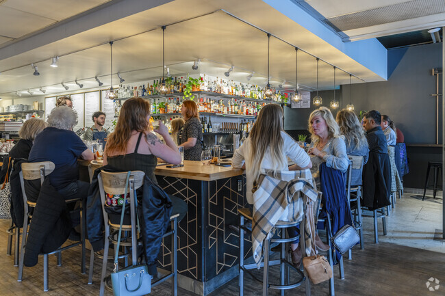 Locals from South Packard sip on a freshly poured cocktail at York Food and Drink.