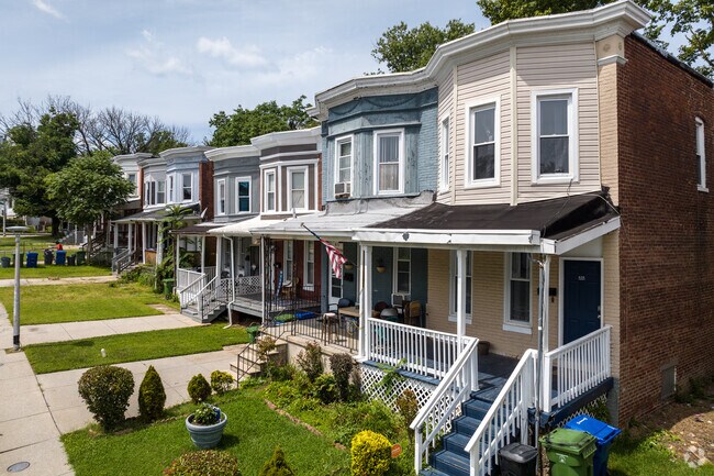 Woodbourne-McCabe boasts classic two-story brick rowhomes featuring beautiful bowed windows.