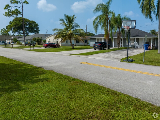 A row of ranch homes in the North Palm Beach Heights neighborhood.