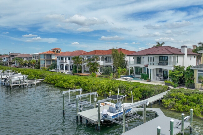 Larger Rocky Point homes can be found closer to the waters edge with pools and private docks.