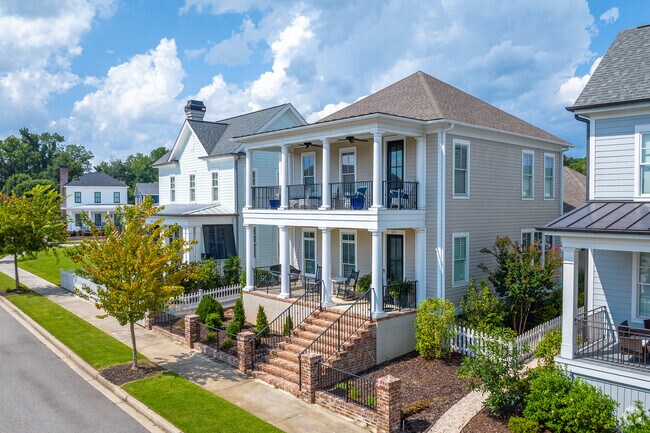 Enjoy the breeze from the two story porches on modern Charleston style homes in Hammonds Ferry.
