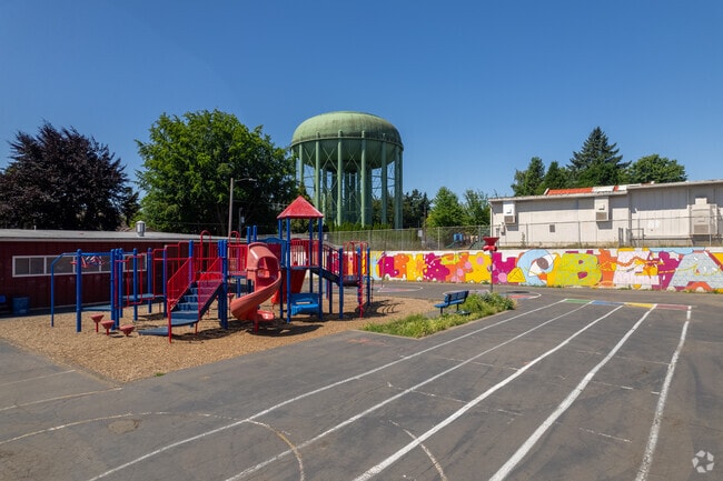 A playground and a 50-yard track are available to Beach Elementary School students.