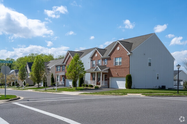 A row of brand new colonial revival homes on Fairford Way in Capitol Heights.