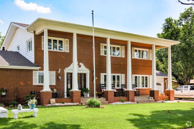 You will find a few Colonial styled homes throughout Benjamin Hills-Pleasant Valley.