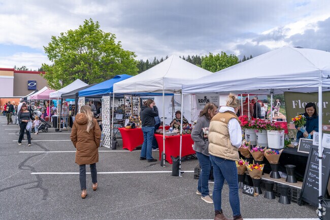 Residents shop at the Monroe Farmers Market every Wednesday during spring and summer time.