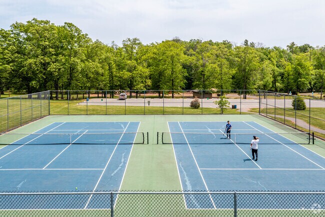 Tennis courts are available in Merrill Park in Woodbridge, NJ.