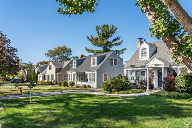 Dormered homes with covered front entries are common in the Briarwood neighborhood.