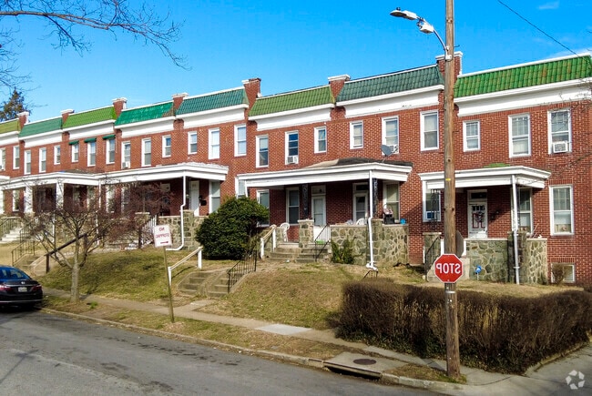 Row homes in the Tremont neighborhood typically span multiple units, creating a traditional Baltimore streetscape.