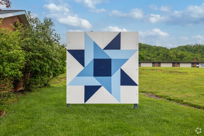 Many residents of Hometown proudly display quilt blocks which represent different regions.