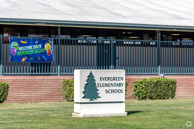 Kids love their teachers at Evergreen Elementary School in Benton Park.
