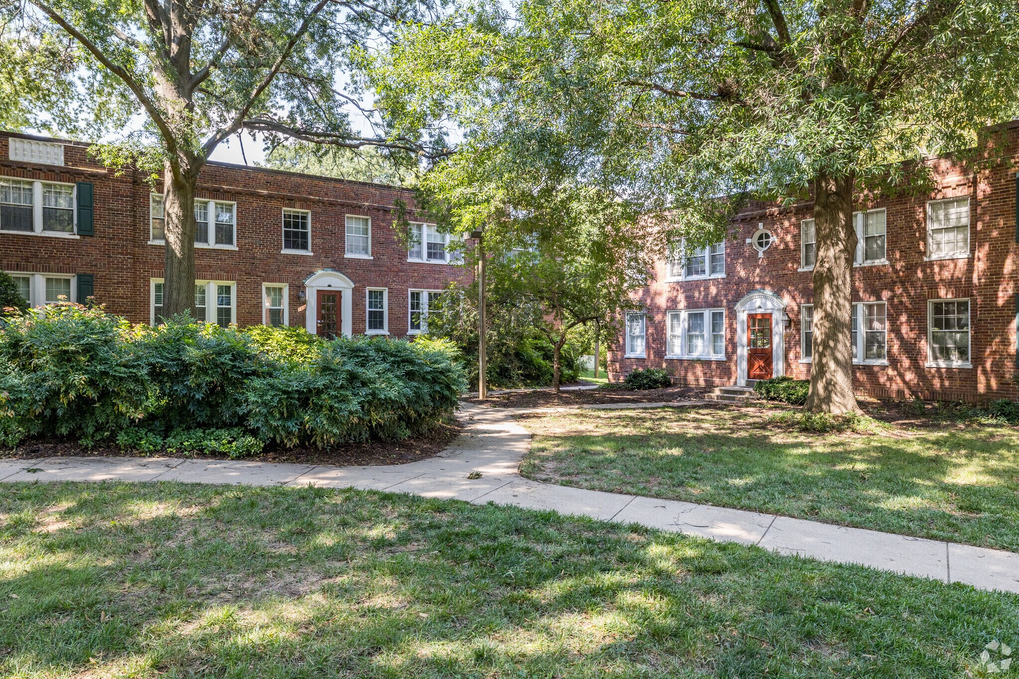 Experience Colonial Village's heritage with its distinctive brick condo colonial building.