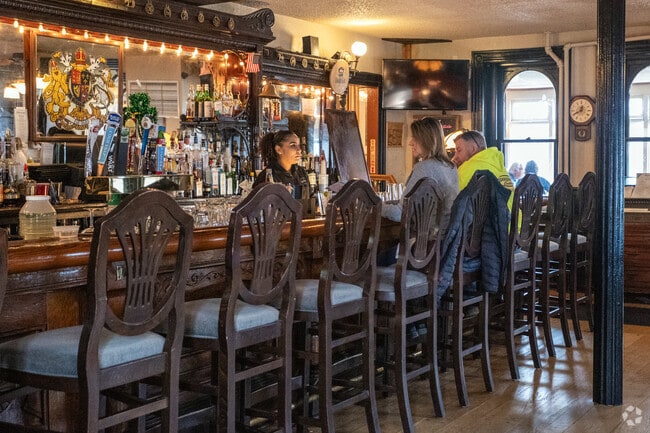 Sit at the bar and order a meal at King George II Inn just minutes from Red Cedar Hill.