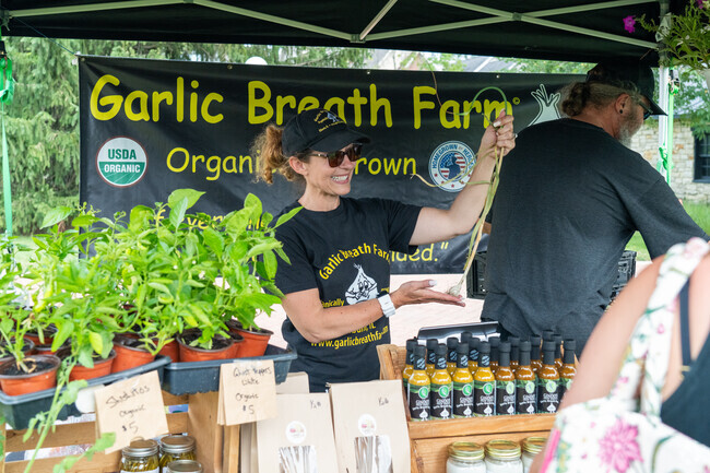 Garlic Breath Farms shows their fresh produce at the Naper Settlement Farmers Market.