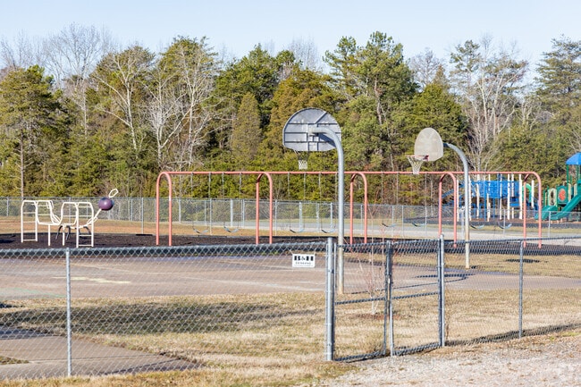 Basketball courts and a playground at Elizabeth Duncan Koontz Elementary School.