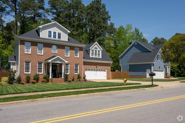 Colonial-style homes are found within the Reserve at Lake Lynn neighborhood.