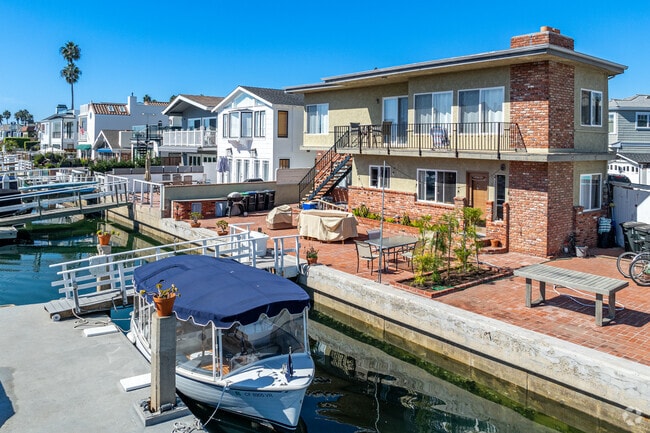 Many Newport Beach City homes have places to park their boats on Balboa Coves.