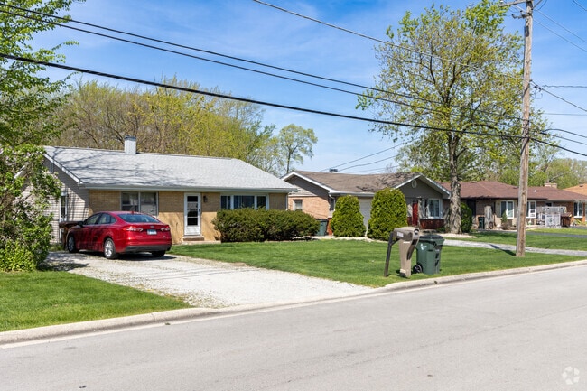 You'll find rows of ranch-style brick homes with siding in Oak Forest.