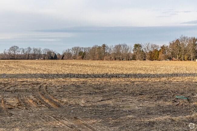 Farms are scattered throughout, providing splashes of green space within the weave of sidewalk-lined roads of Mercerville, NJ.