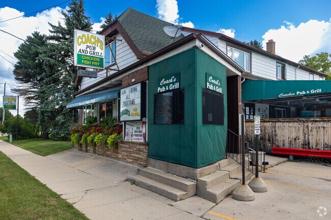 With its green details and vintage charm, Coach’s Pub ’N’ Grill is a great place to grab a bite.