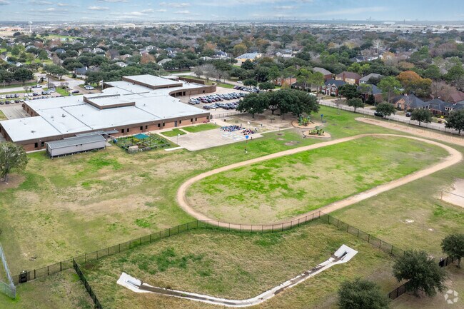 Owens Elementary School's essence unfolds gracefully from the sky.
