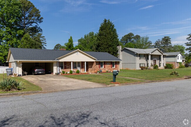 Eclectic rows of homes in multiple styles can be found in Camelot.