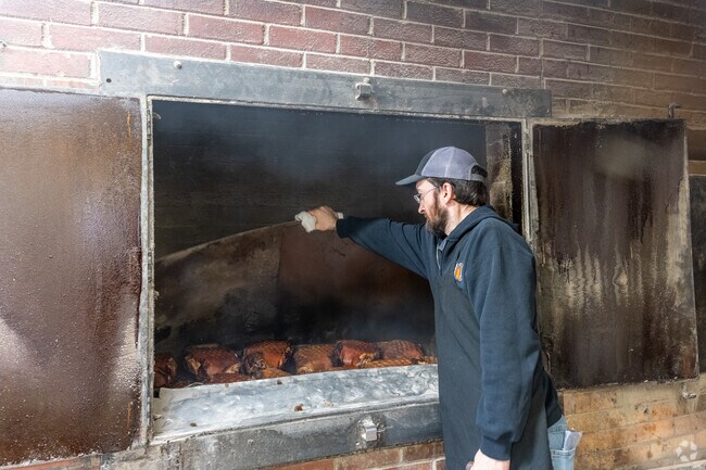 They use real wood to smoke the meat at Real Q in Winston-Salem.