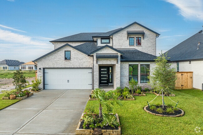 Nicely manicured lawns accommodate many split-level homes in the Santa Fe neighborhoods.