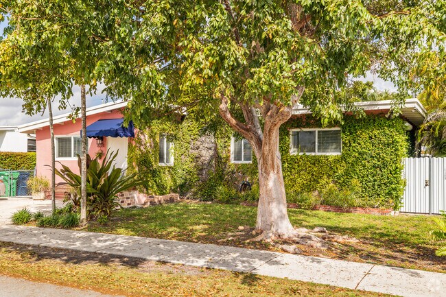 Enrich yourself in your beautiful Mid-century ranch style home in Olympia Heights, FL.