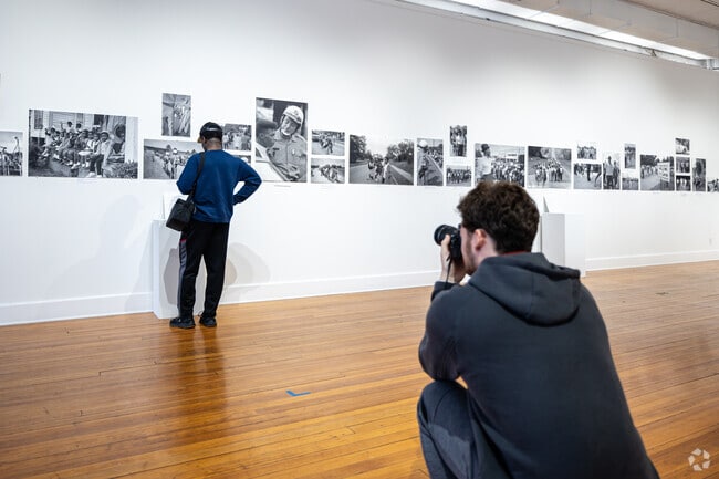 A photography class visits this gallery of works at Jacoby's Art Center in Alton.