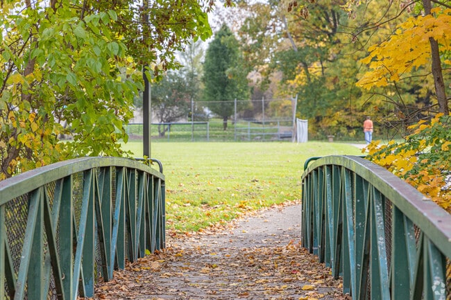 An Almont resident takes a stroll at Almont Community Park.