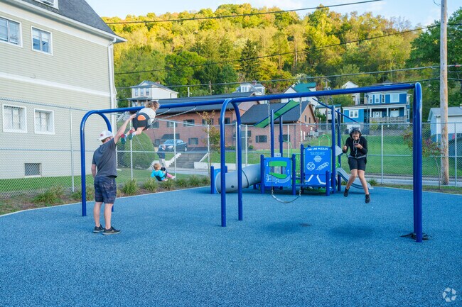 Families can enjoy flying high on the swings at Edgington Lane Park in Woodsdale.