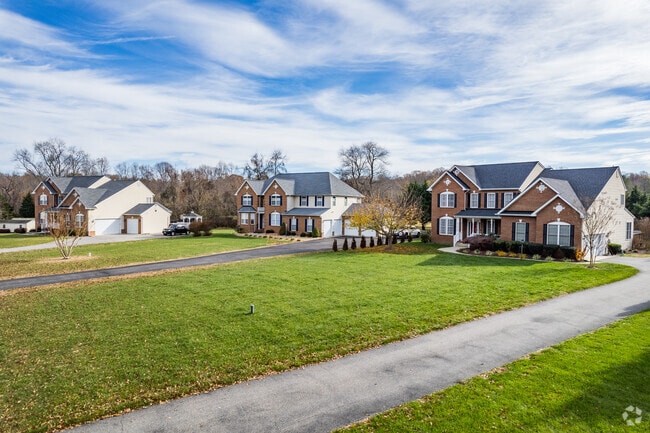 Discover Dunkirk's contemporary charm in neo-colonial homes, blending tradition with modern.