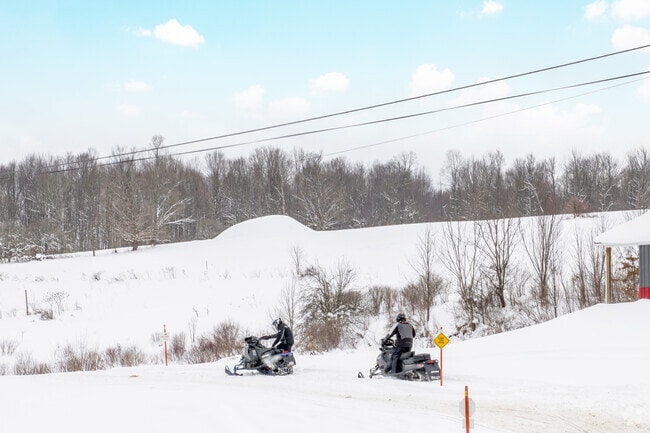 Snowmobiling trails around Busti provide thrilling winter adventures through scenic rural landscapes.