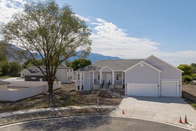 This cul-de-sac in Harrisville is surrounded by trees and has a gorgeous view of the mountains.