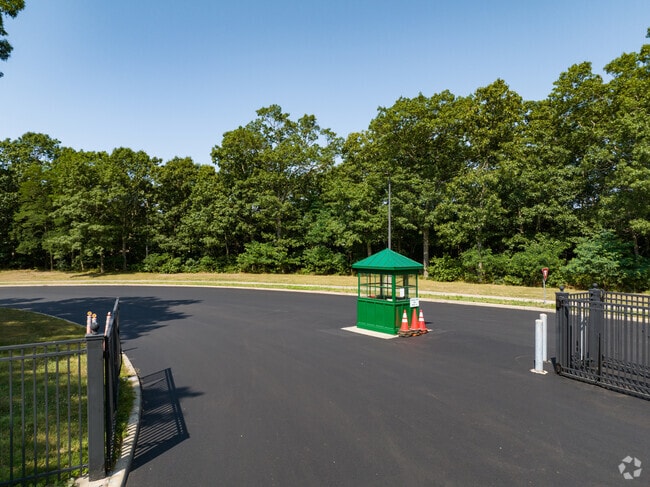 William Floyd Middle School has a security gate with a guard there at all times.