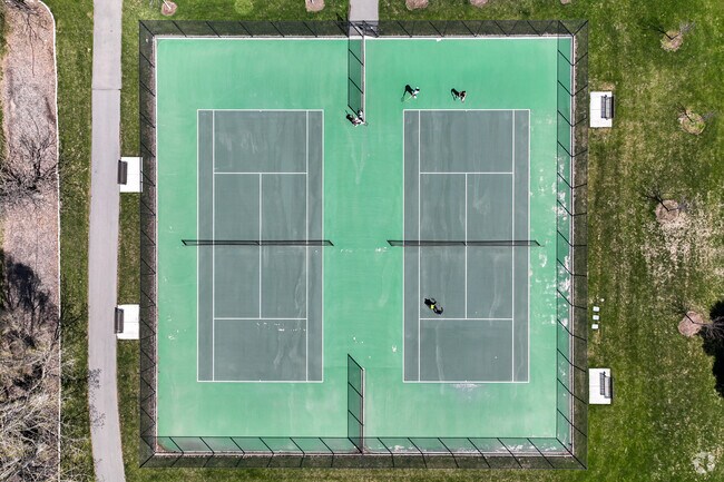 Challenge friends to a game of tennis at Palisades Park near Orchard South.
